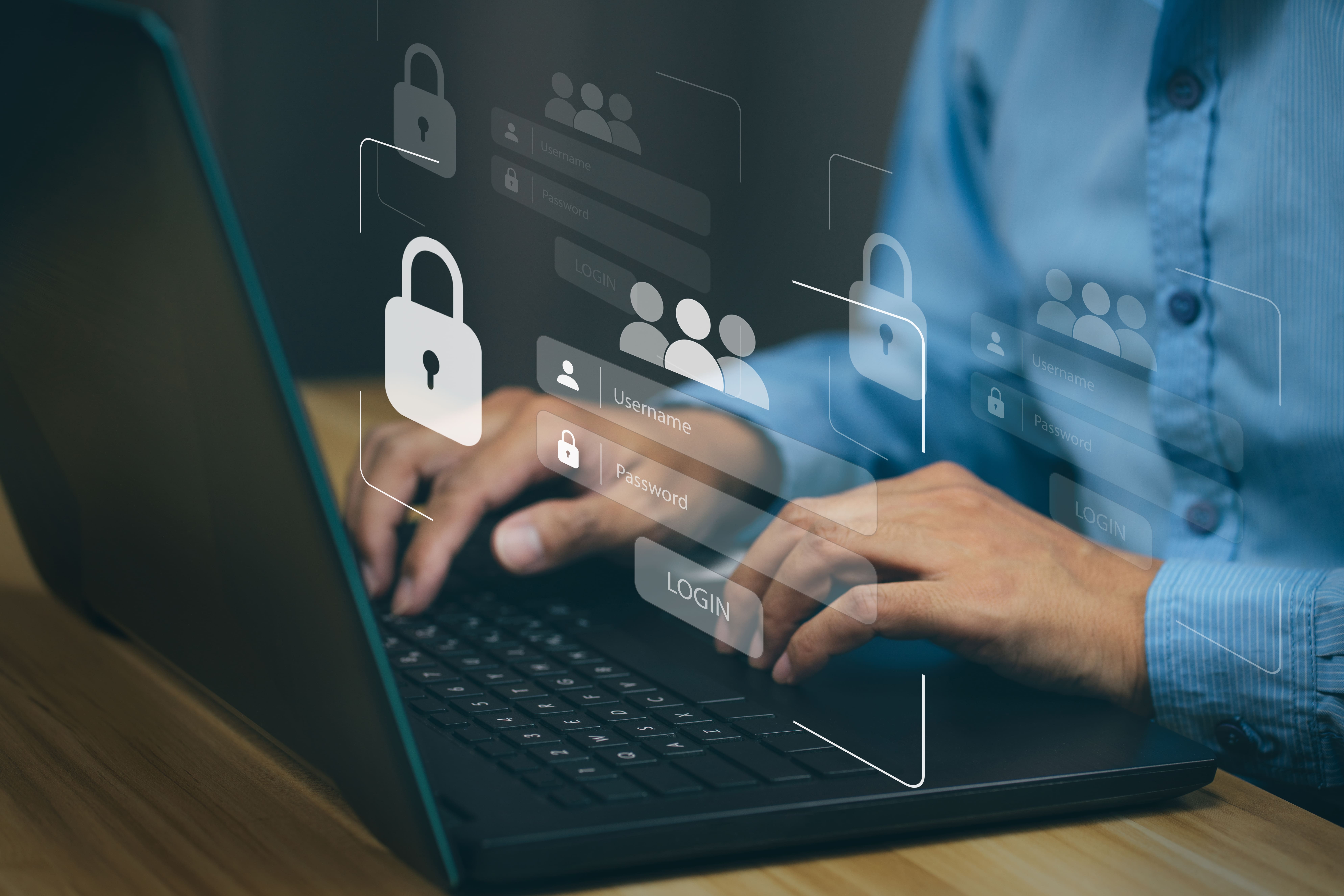 Benutzer bei der Passwort-Eingabe auf Laptop, Sicherheits-Login, Thema: Online-Datenschutz und Cybersicherheit.